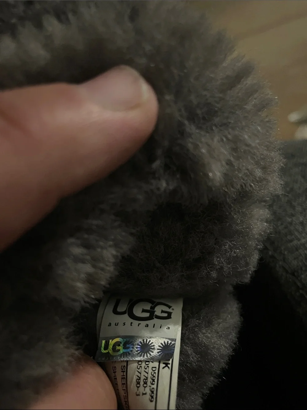 UGG Kids Short Shearling Boots in Gray with Pom Detail